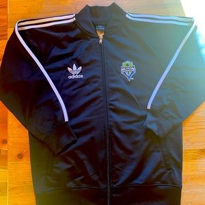 Young men’s size Medium (10-12) Adidas Seattle Sounders zip up jacket. NWOT